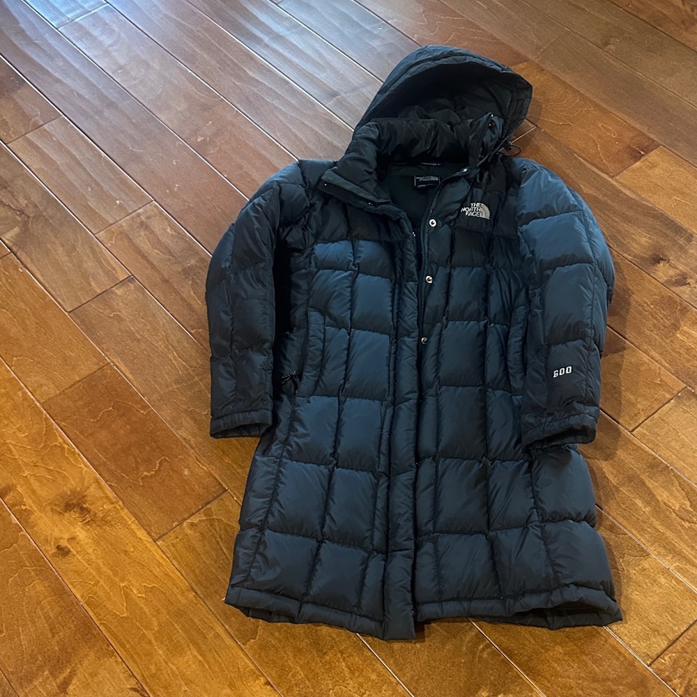 The North Face Black Quilted Long Coat. This is a warm beautiful coat!